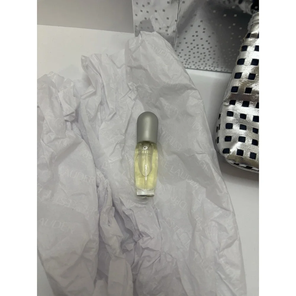 Estee Lauder NeverUsed Beautiful Silver Makeup Bag W/ Zipper & Sample Bottle